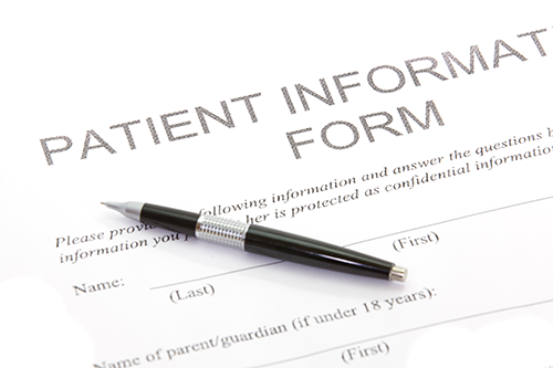 new patients | photo of a patient information form